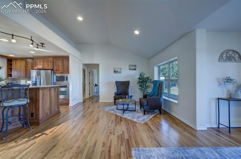 1905 Mesa Road Colorado Springs, CO 80904 - Photo 43 of 44 a living room with furniture and a wooden floor