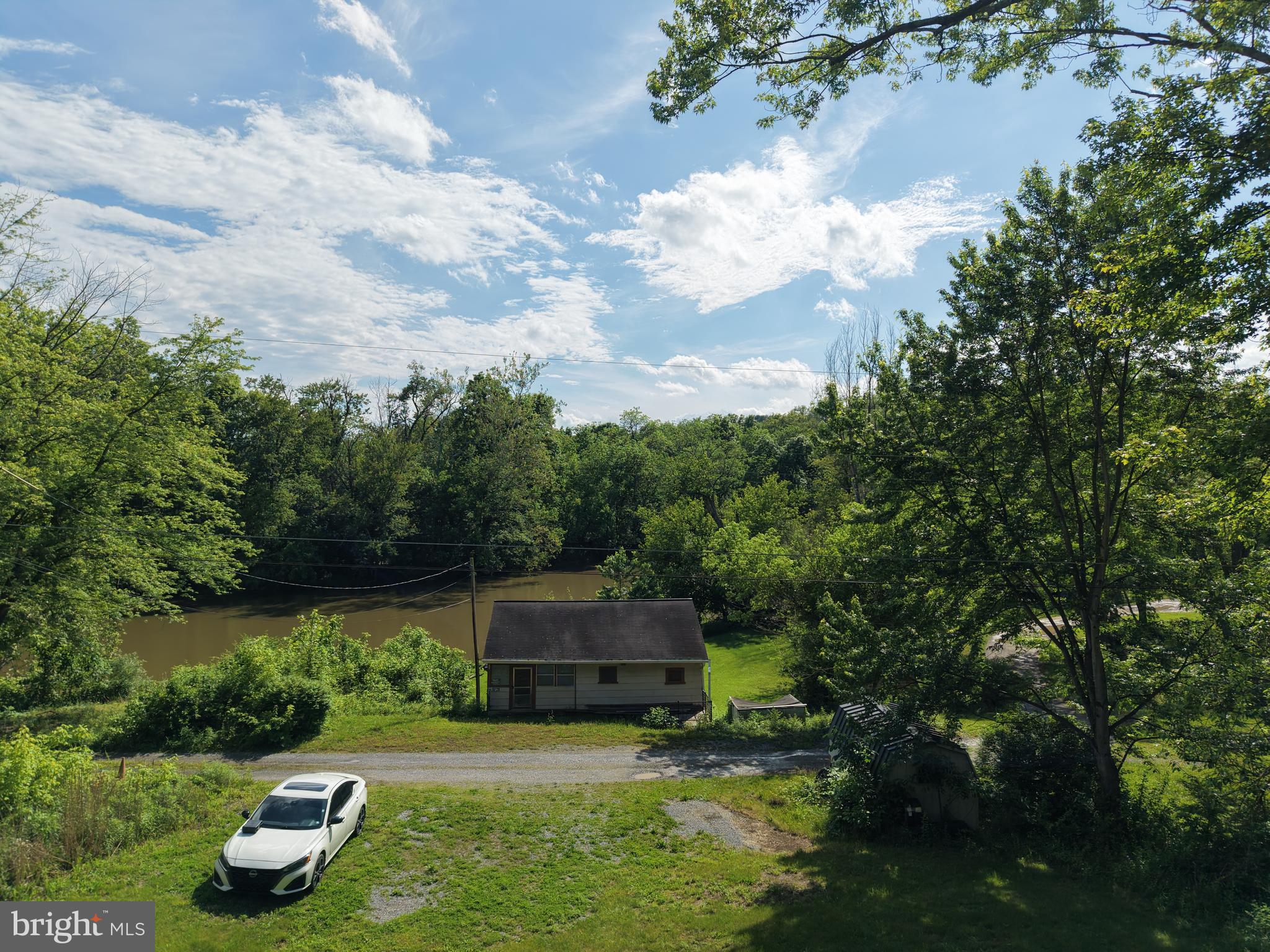 13726 Hopps Landing Road Hagerstown, MD 21740 - Photo 13 of 71 a backyard of a house with lots of green space