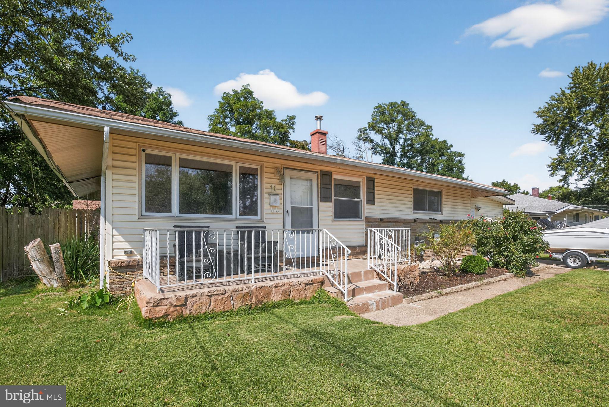 11 La Gorce Boulevard Burlington, NJ 08016 - Photo 1 of 22 a view of a house with a backyard and a patio