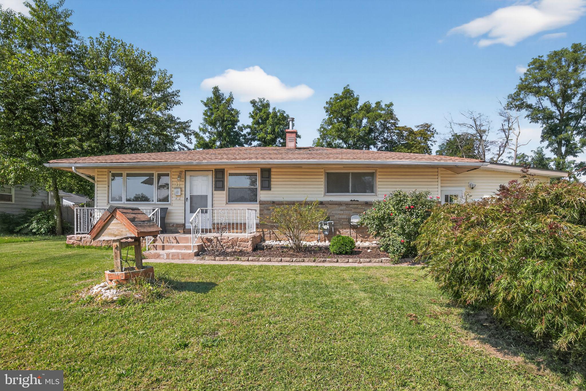 11 La Gorce Boulevard Burlington, NJ 08016 - Photo 2 of 22 a patio with sofas fire pit table and chairs