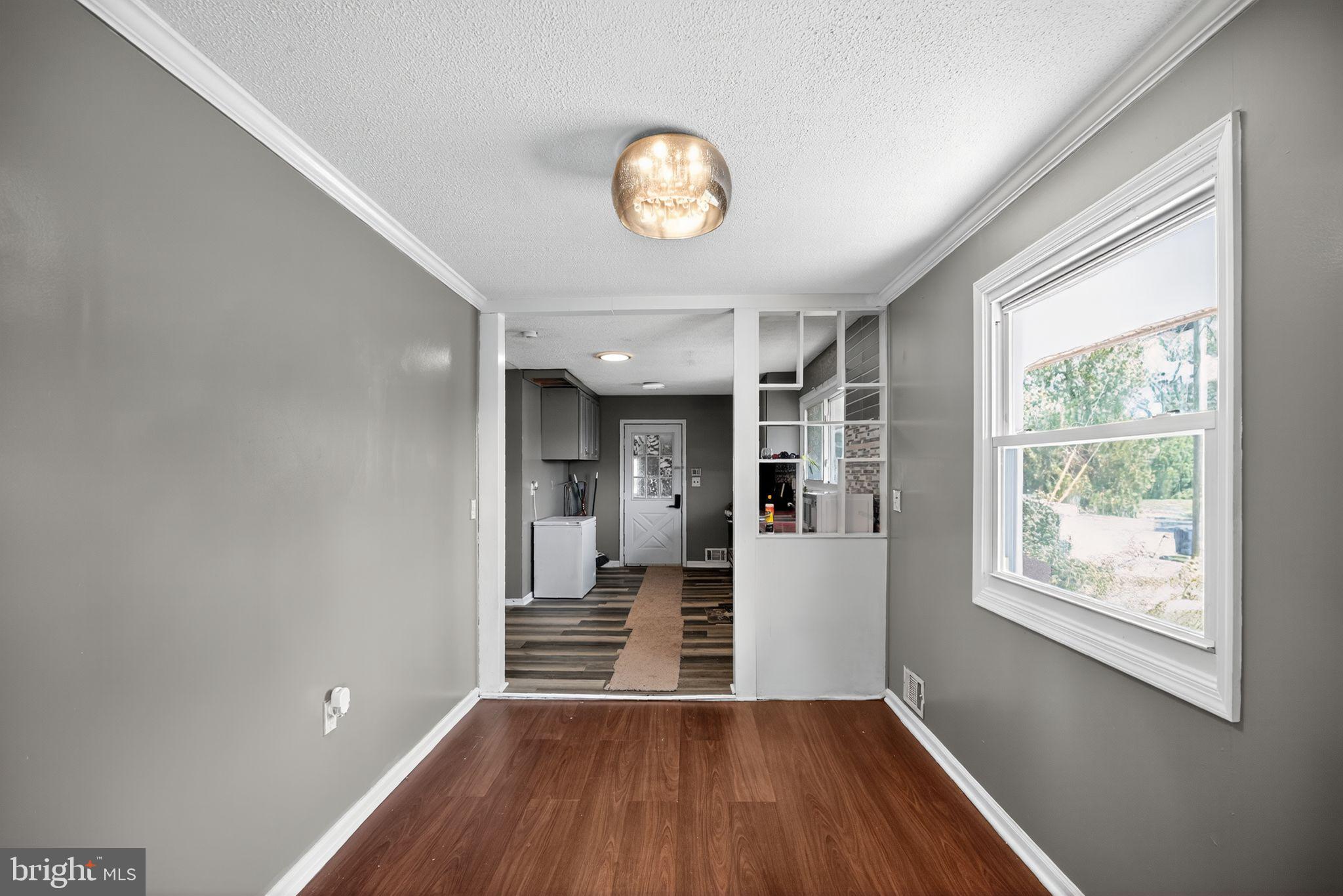 11 La Gorce Boulevard Burlington, NJ 08016 - Photo 9 of 22 a view of entryway with wooden floor