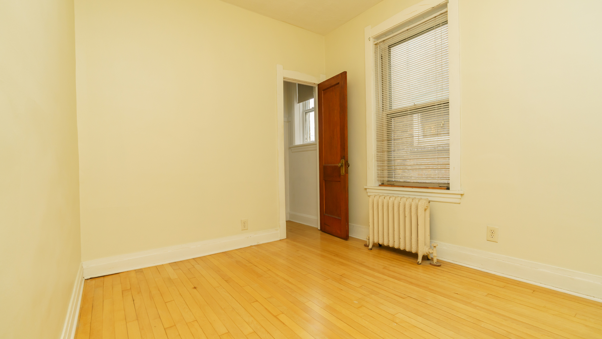 2644 North Harding Avenue Chicago, IL 60647 - Photo 13 of 37 a view of an empty room with wooden door