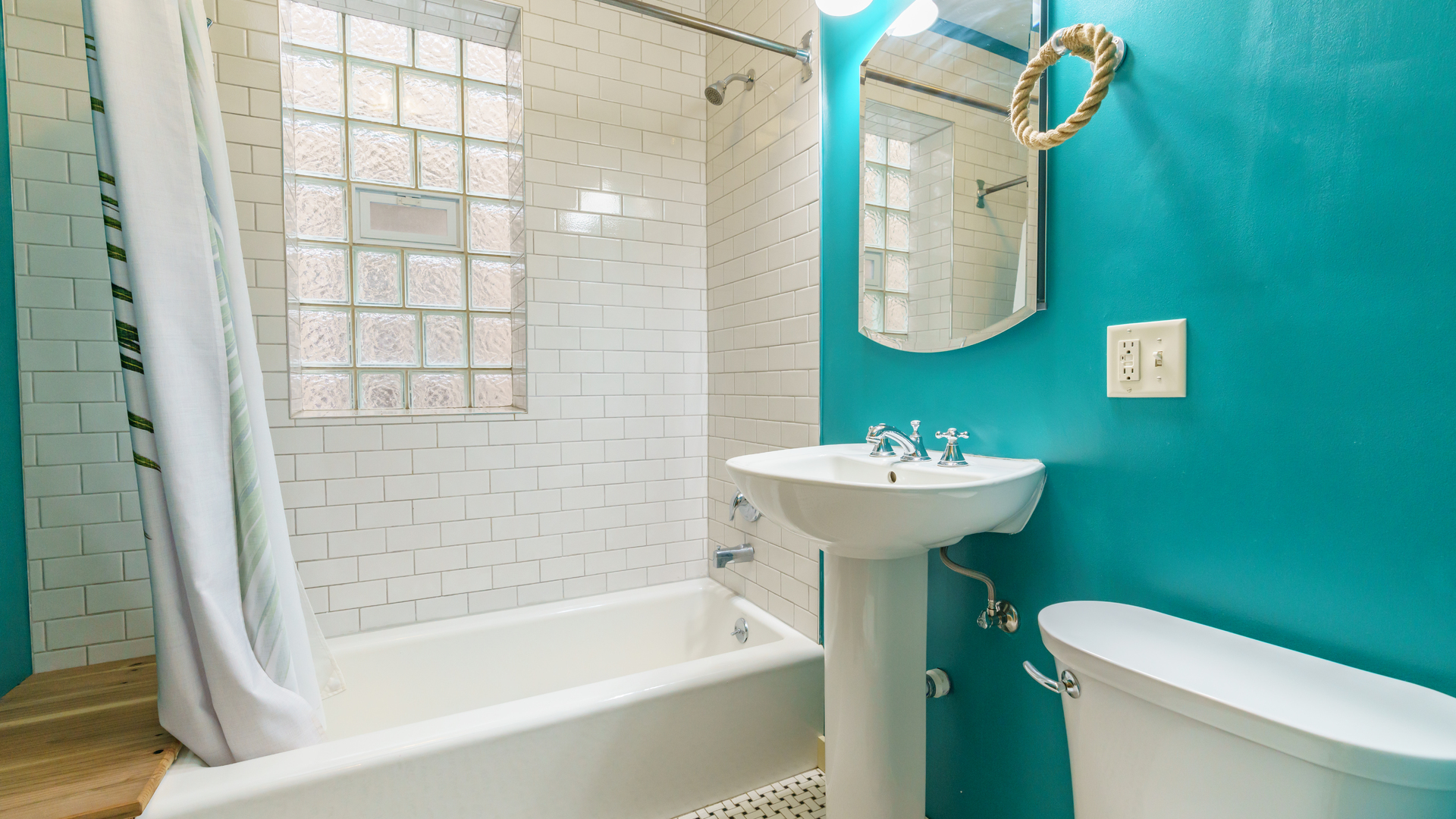 2644 North Harding Avenue Chicago, IL 60647 - Photo 16 of 37 a bathroom with a sink a toilet and shower