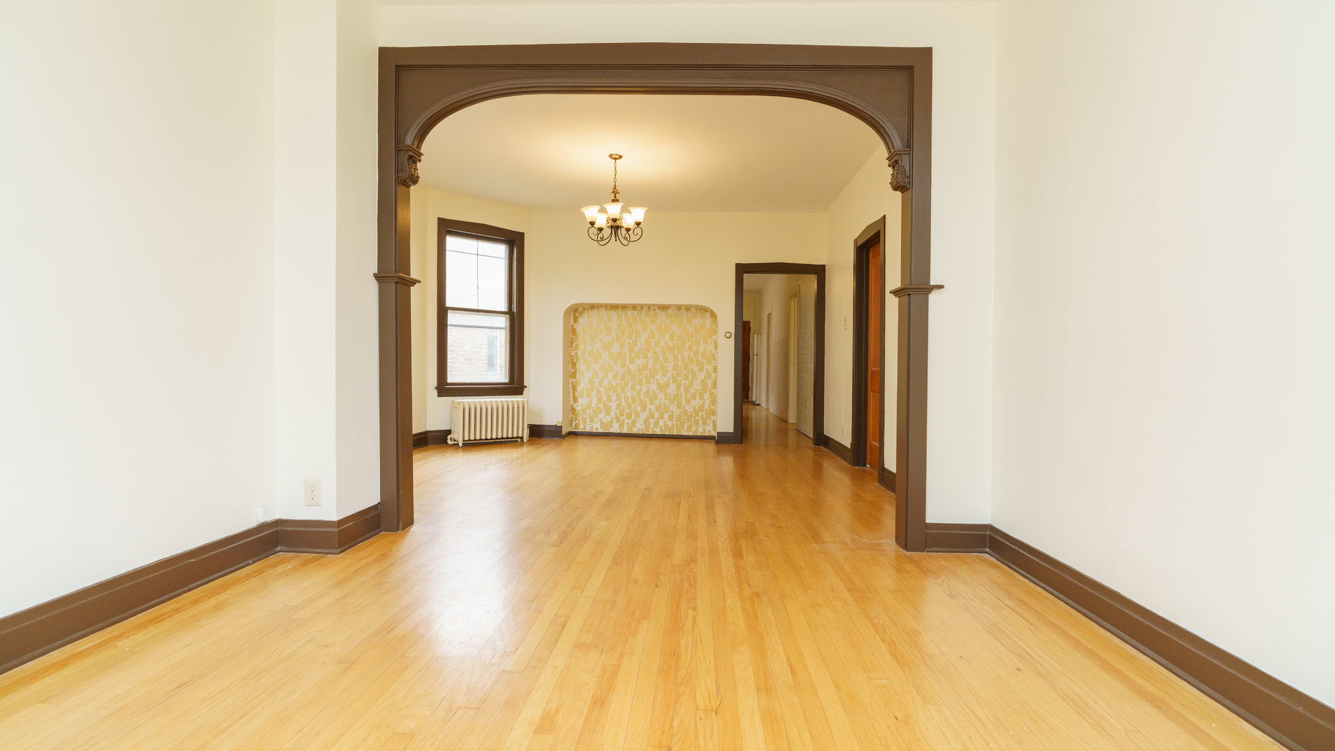 2644 North Harding Avenue Chicago, IL 60647 - Photo 18 of 37 a view of a room with wooden floor and entryway