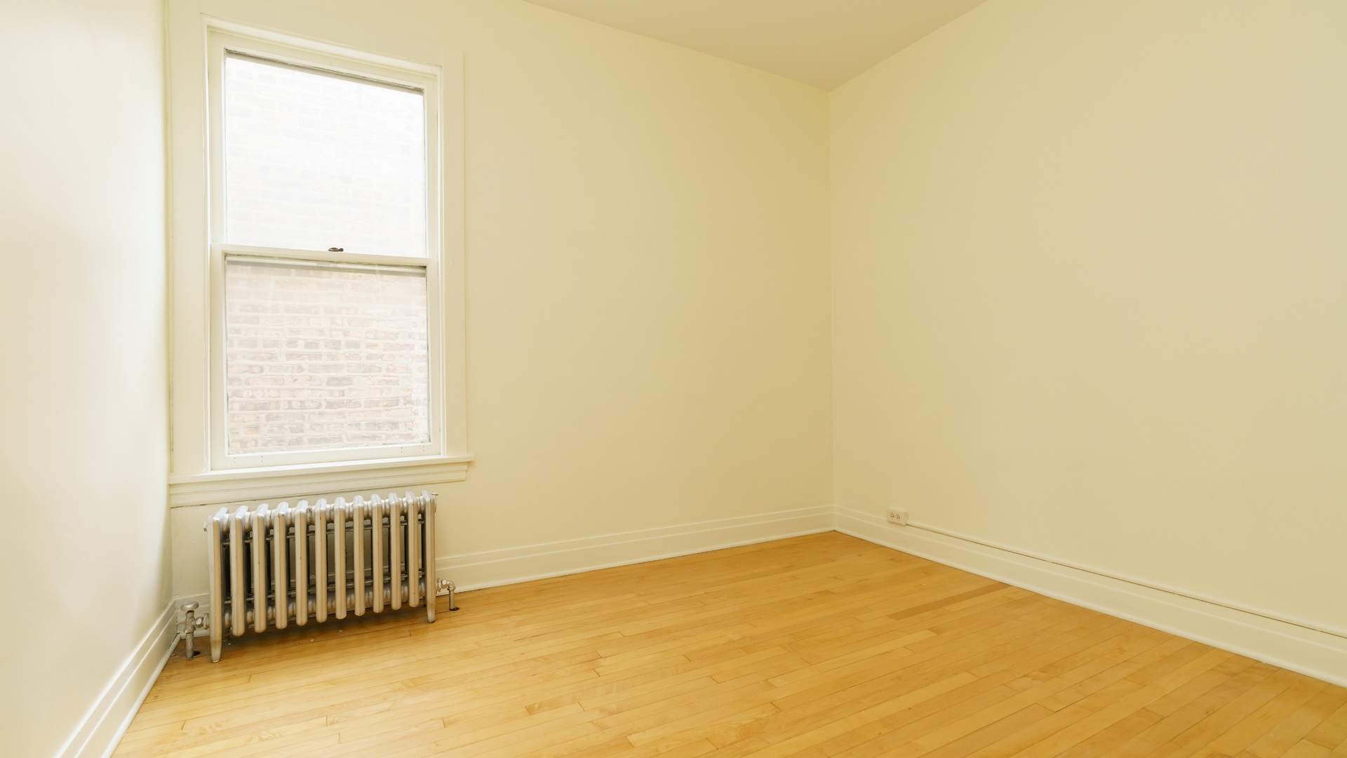 2644 North Harding Avenue Chicago, IL 60647 - Photo 25 of 37 an empty room with a window