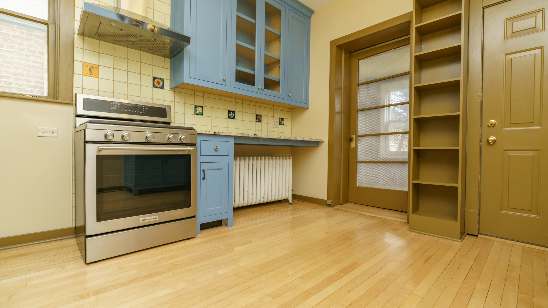2644 North Harding Avenue Chicago, IL 60647 - Photo 8 of 37 a view of an empty room with a fireplace