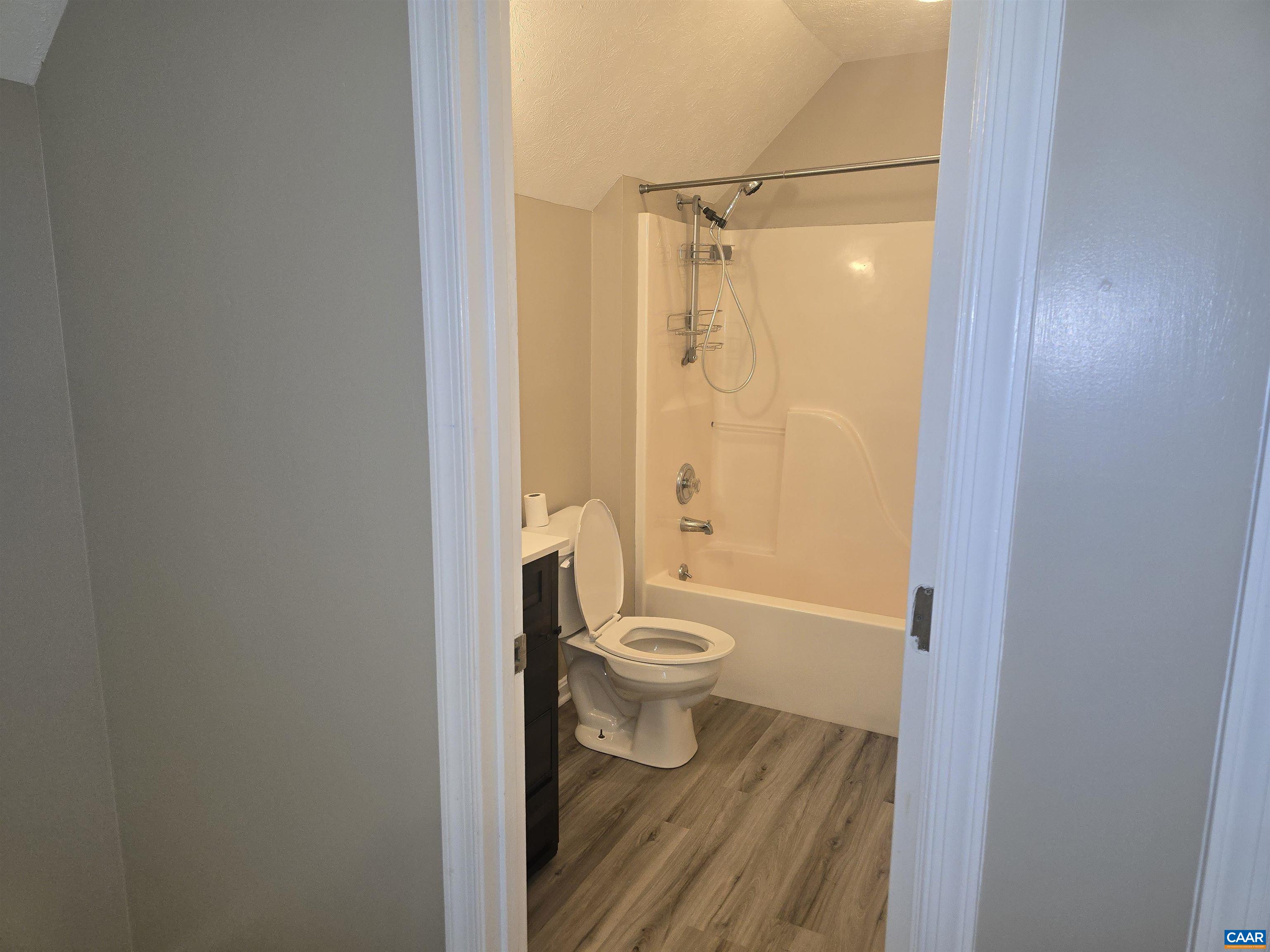 79 Haney Road Ruckersville, VA 22968 - Photo 12 of 15 a bathroom with a toilet and a shower