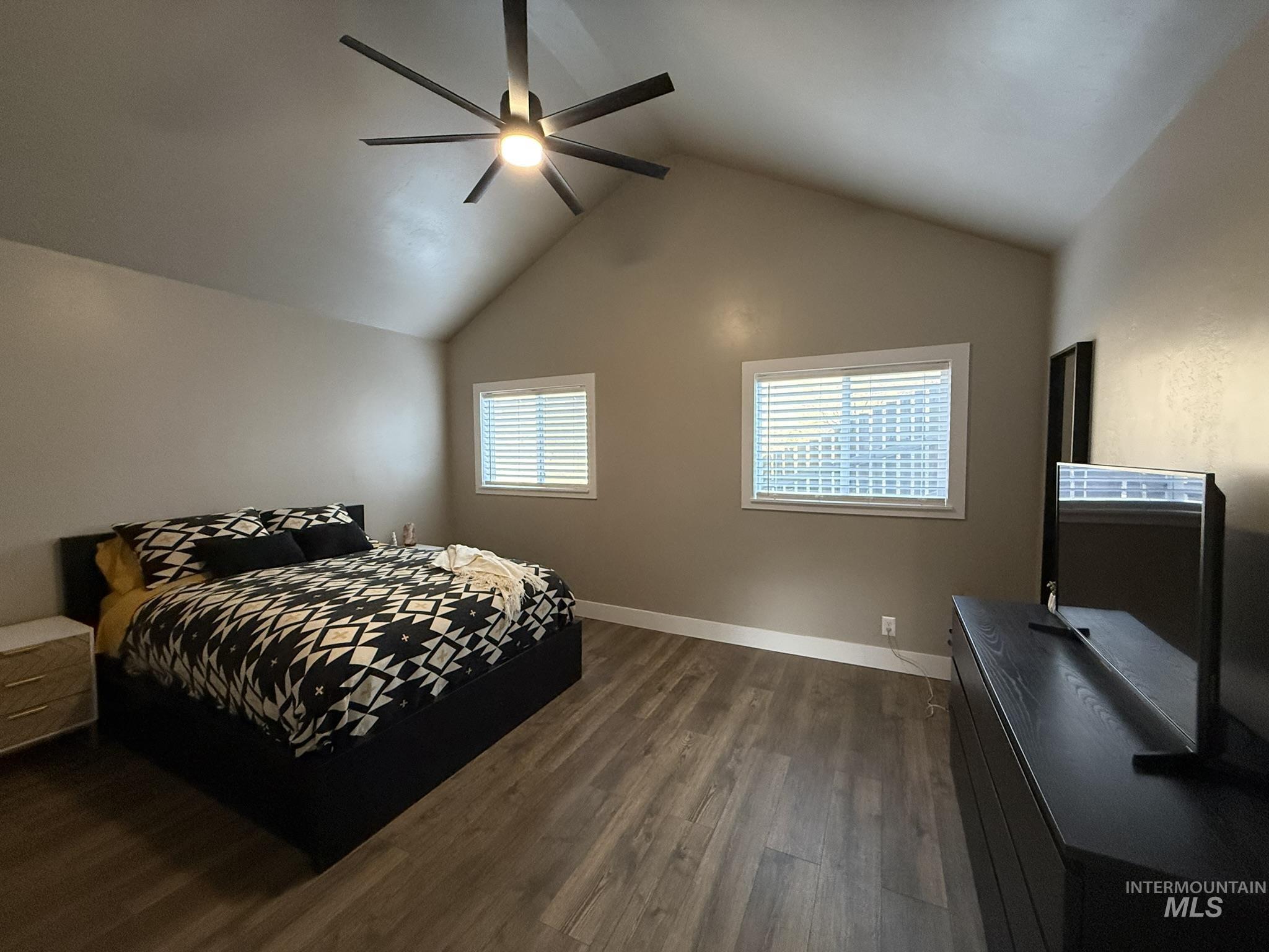532 Old Pollock Road Riggins, ID 83549 - Photo 24 of 25 Bedroom with dark wood-style flooring and a ceiling fan