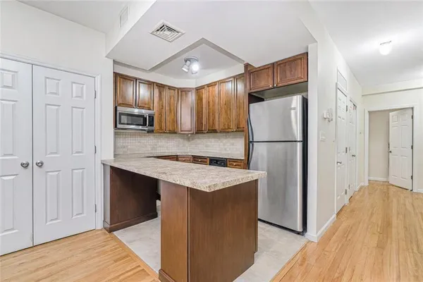 $839,000 | 8405 19th Avenue, Unit 2B | Van Pelt Manor