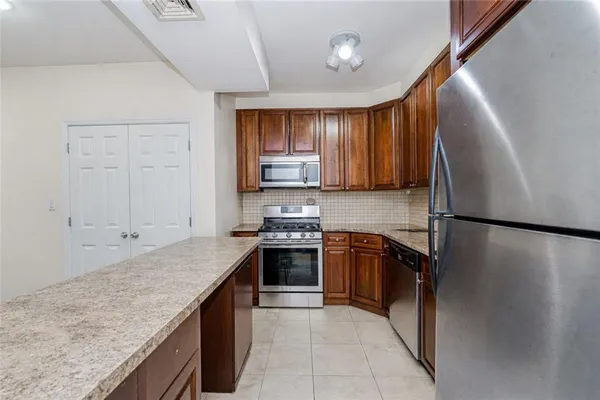 $839,000 | 8405 19th Avenue, Unit 2B | Van Pelt Manor