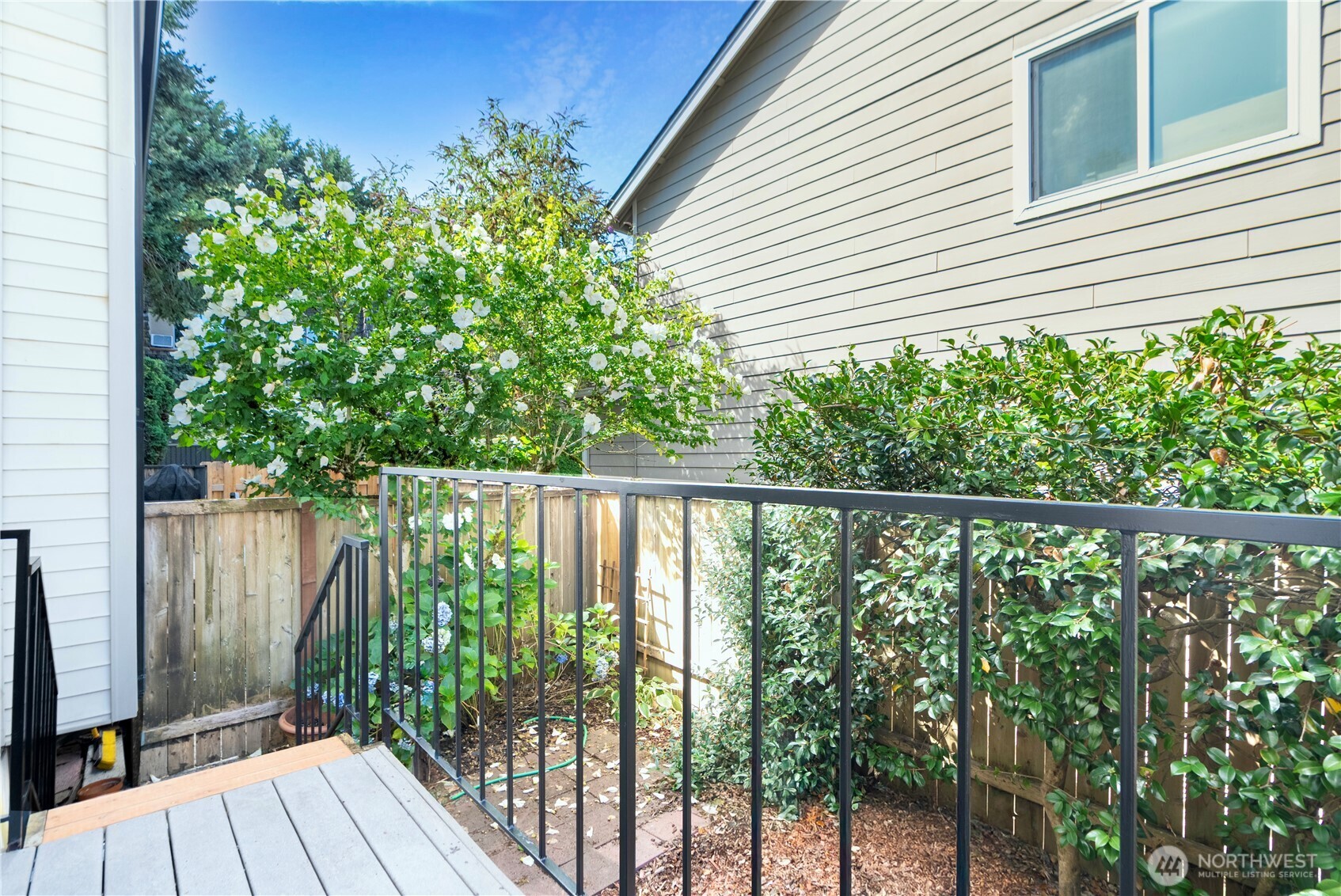 4217 Northeast 5th Street Renton, WA 98059 - Photo 14 of 24 a view of a balcony with wooden floor