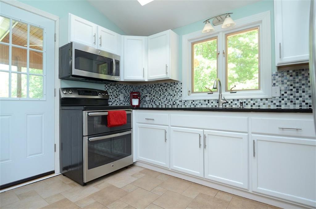 541 Duck Pond Road Westbrook, ME 04092 - Photo 11 of 35 This sharp kitchen fills with...
