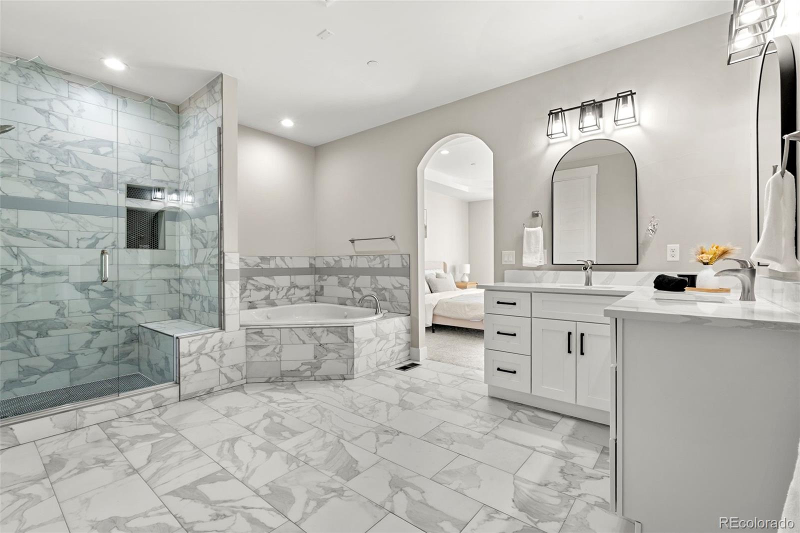 12450 Imboden Road Hudson, CO 80642 - Photo 22 of 46 a bathroom with a sink a toilet and a mirror