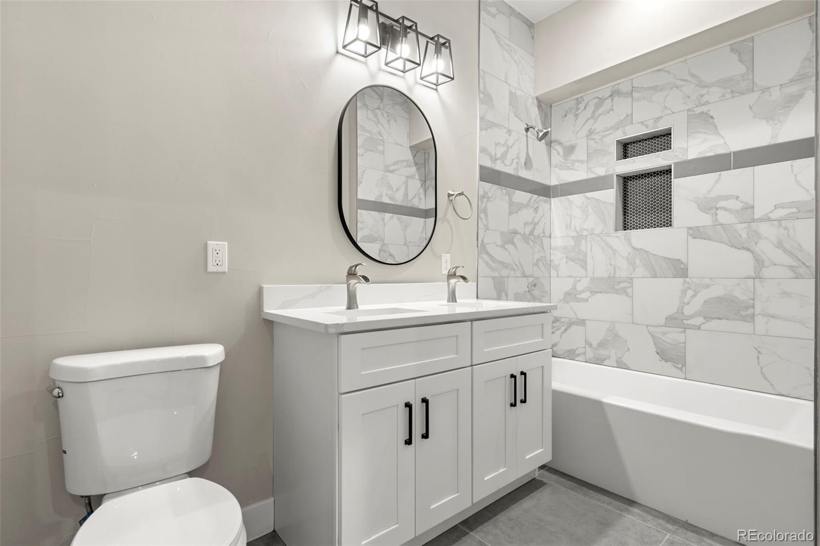 12450 Imboden Road Hudson, CO 80642 - Photo 26 of 46 a bathroom with a toilet sink and mirror