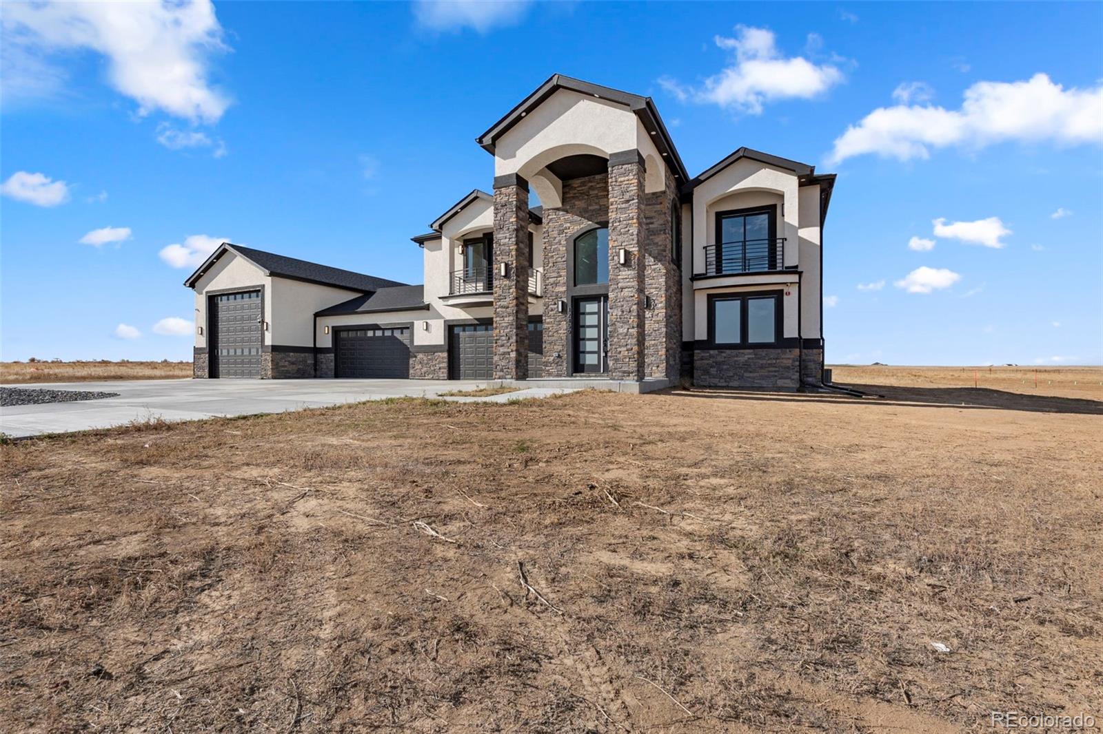 12450 Imboden Road Hudson, CO 80642 - Photo 3 of 46 a view of a house with a yard