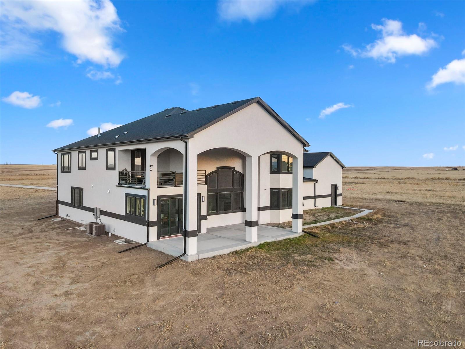 12450 Imboden Road Hudson, CO 80642 - Photo 41 of 46 a view of a house with a wooden fence