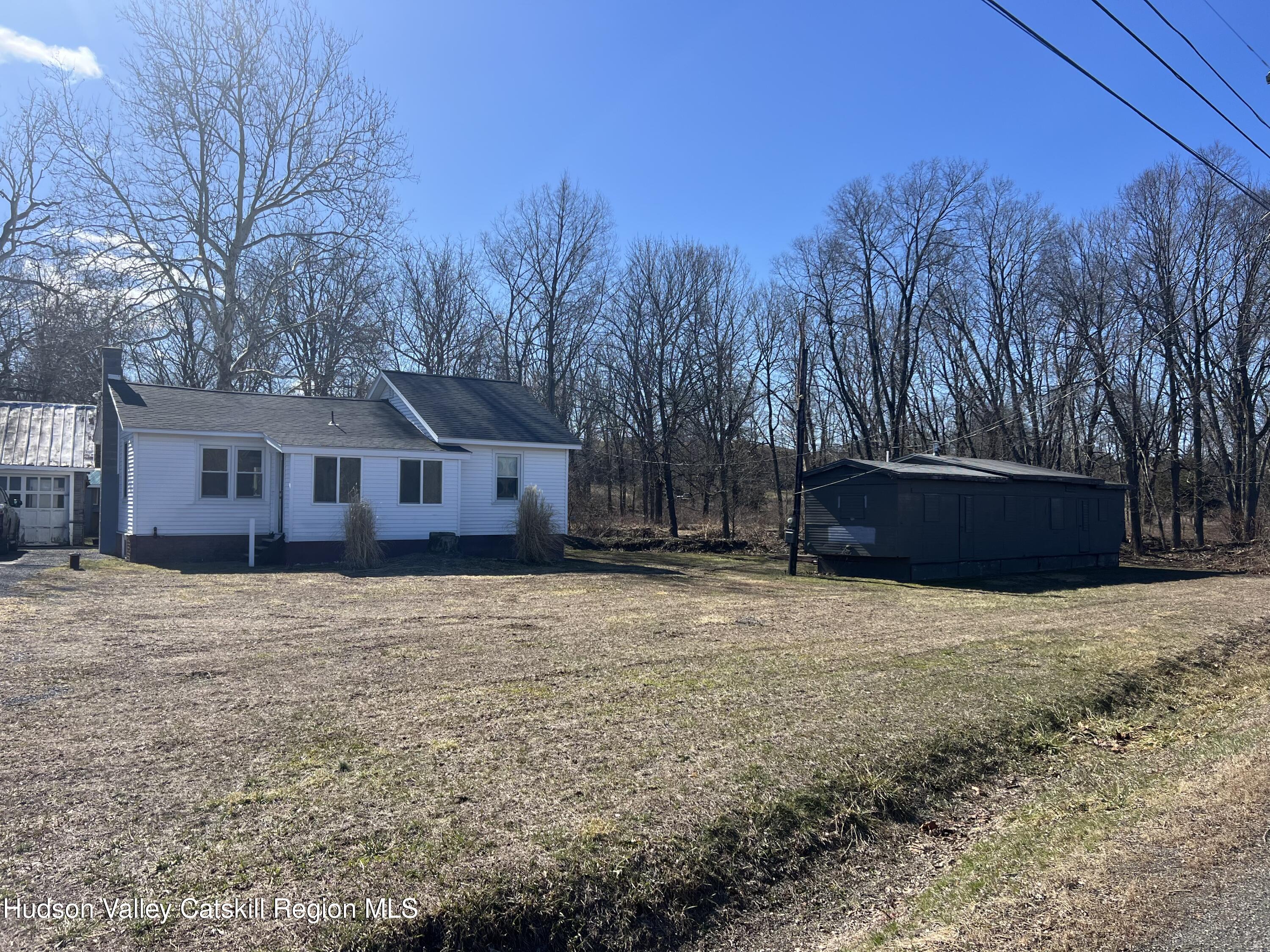 168 County Route Hudson, NY 12534 - Photo 18 of 20 a front view of a house with a yard