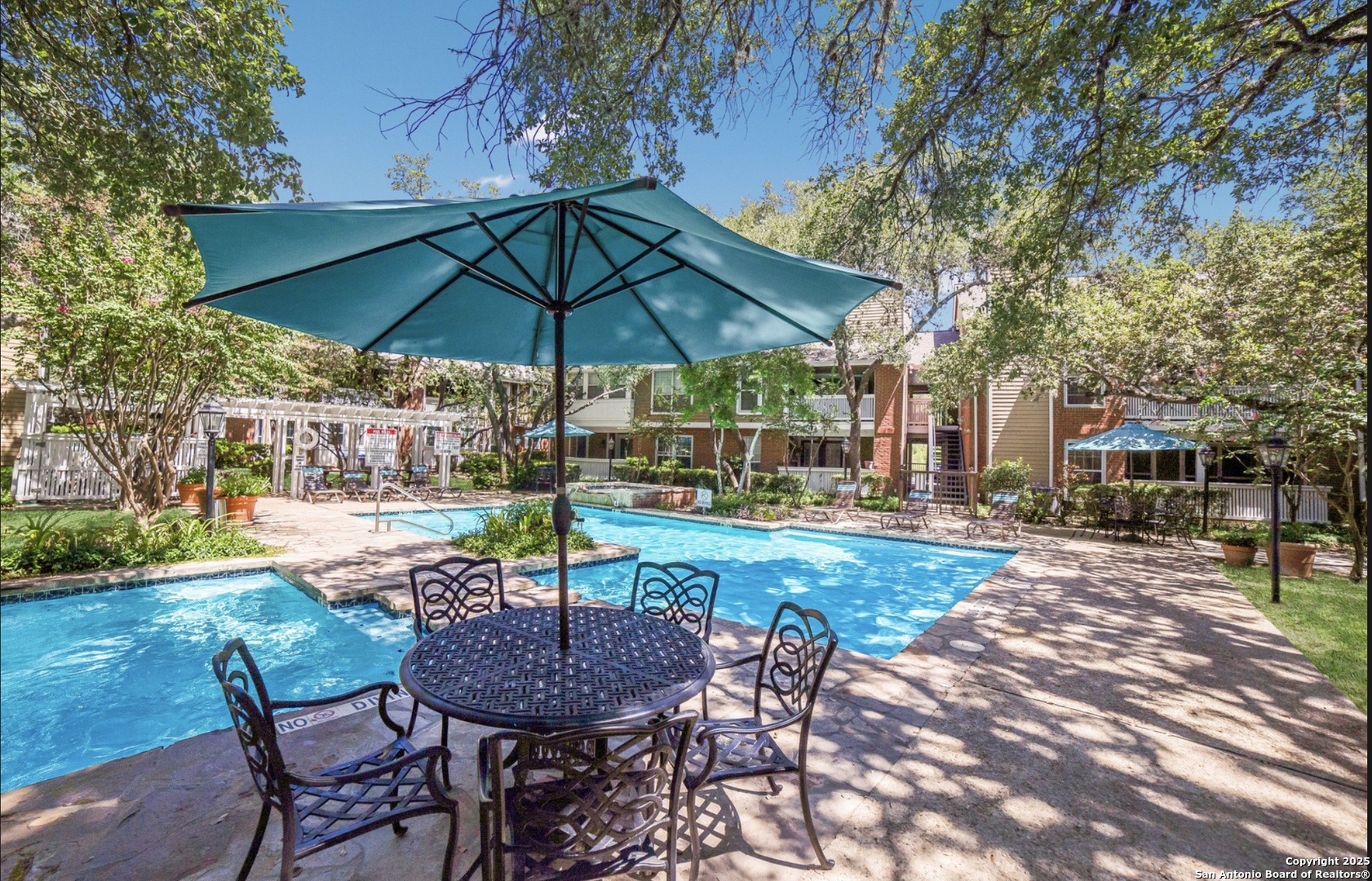 13130 Blanco Road, Unit 206 San Antonio, TX 78216 - Photo 11 of 12 a view of a backyard with sitting area and furniture