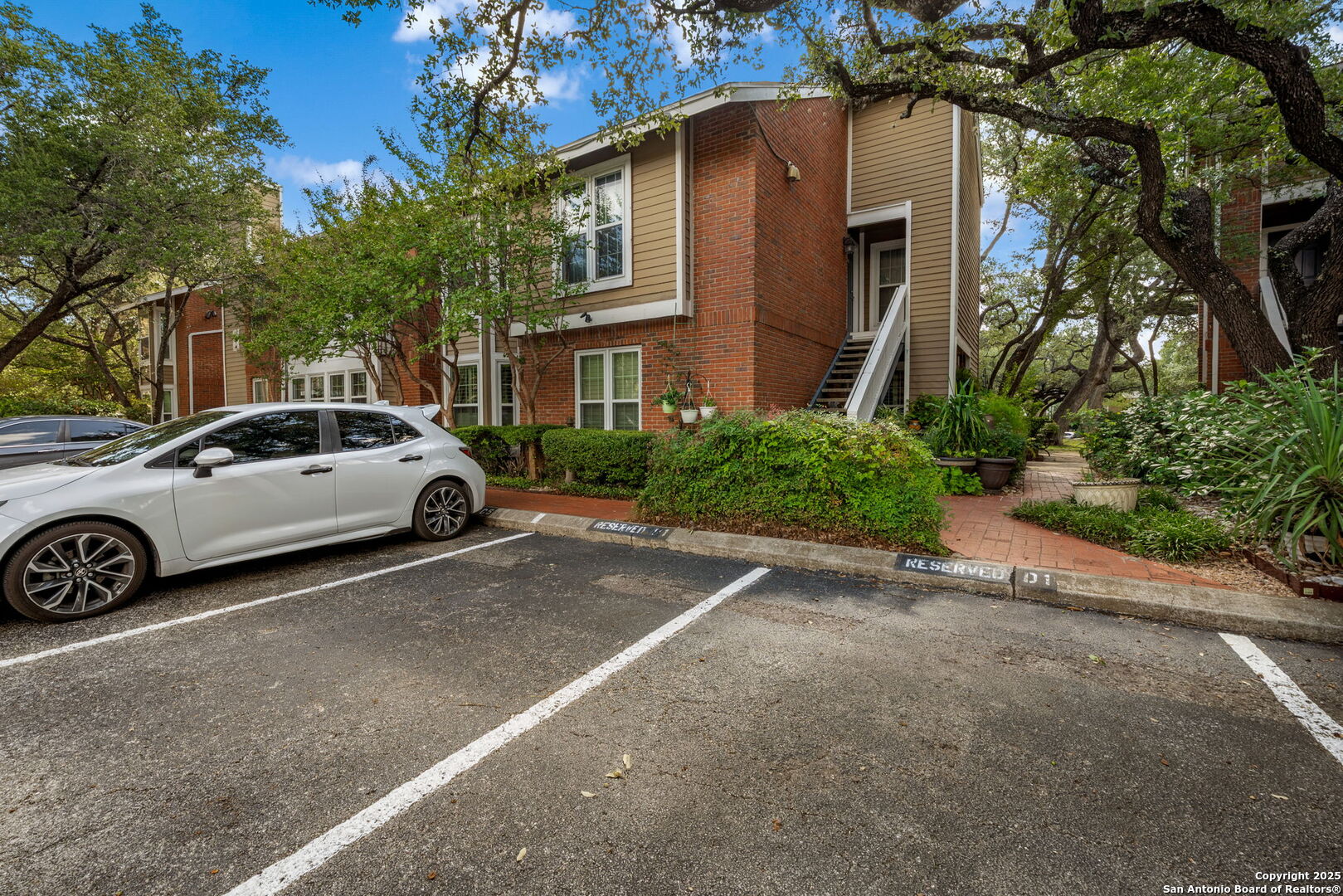 13130 Blanco Road, Unit 206 San Antonio, TX 78216 - Photo 12 of 12 a view of a car parked in front of a house