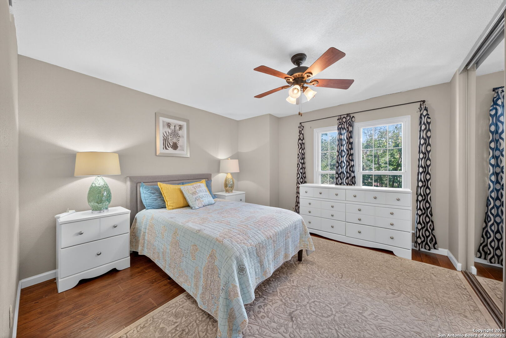 13130 Blanco Road, Unit 206 San Antonio, TX 78216 - Photo 8 of 12 a bedroom with a bed and a window