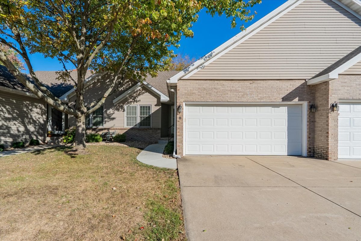 107 North Blair Drive, Unit 8 Normal, IL 61761 - Photo 1 of 29 a view of a house with a yard