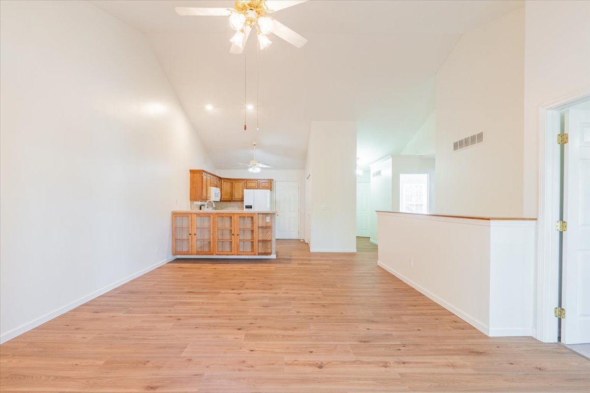 107 North Blair Drive, Unit 8 Normal, IL 61761 - Photo 13 of 29 a view of an empty room with wooden floor
