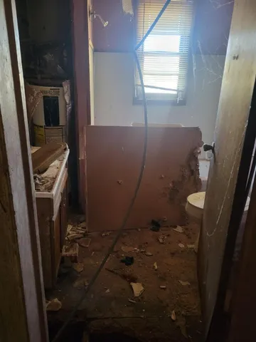 a room with furniture and a window