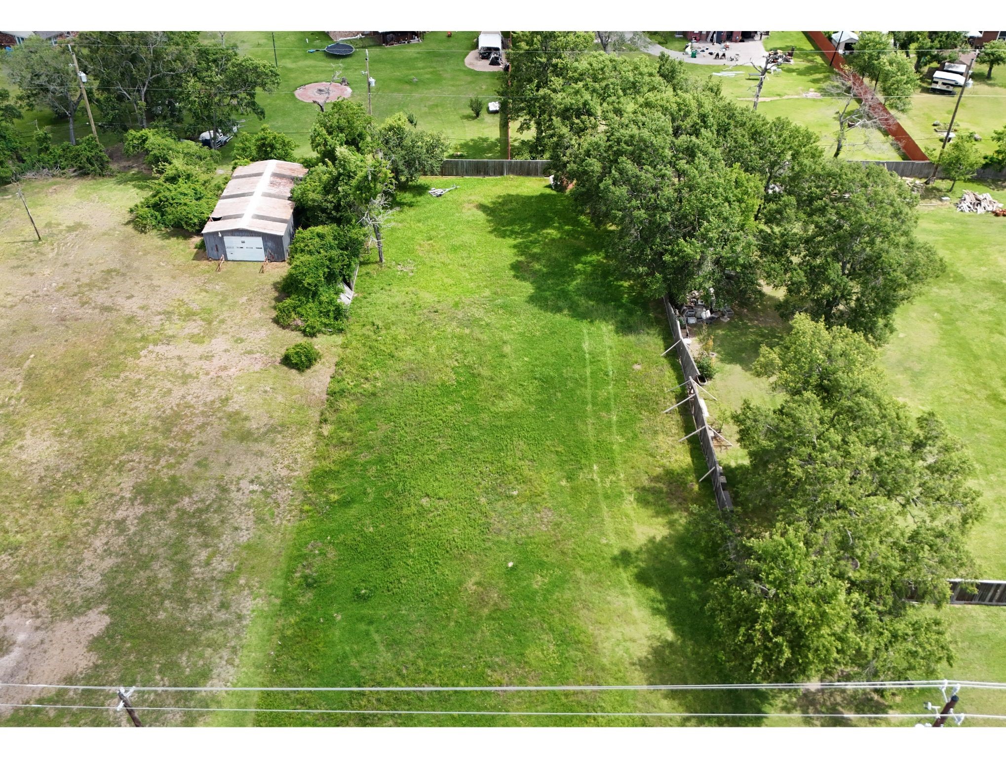 2720 Red Bluff Road Seabrook, TX 77586 - Photo 6 of 6 a backyard of a house with a yard and outdoor seating