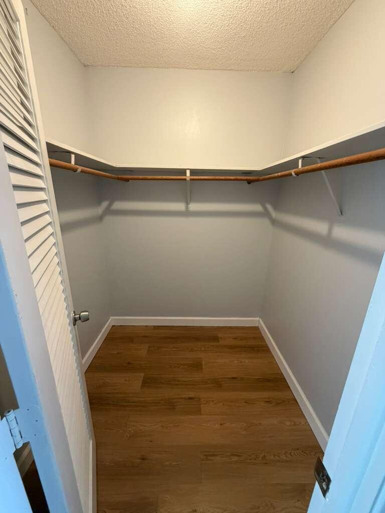 2601 South Course Drive, Unit 203 Pompano Beach, FL 33069 - Photo 20 of 33 a view of a room with shelf