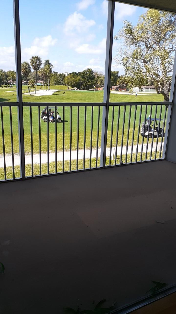 2601 South Course Drive, Unit 203 Pompano Beach, FL 33069 - Photo 28 of 33 a view of balcony with furniture