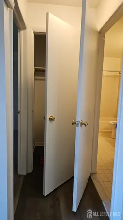 a view of small space with racks on the wall