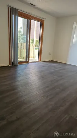 a view of storage and utility room with a garage