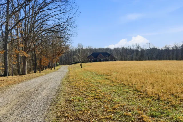 a view of a room with window and wooden floor