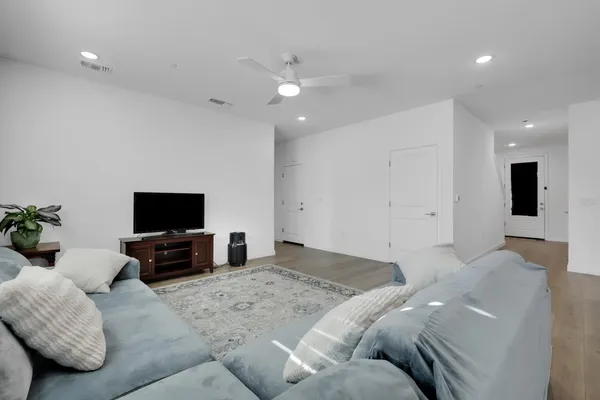 a kitchen with a table and chairs in it