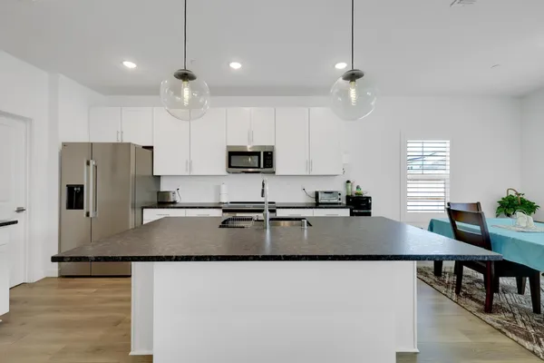 a view of storage and utility room with racks on the wall