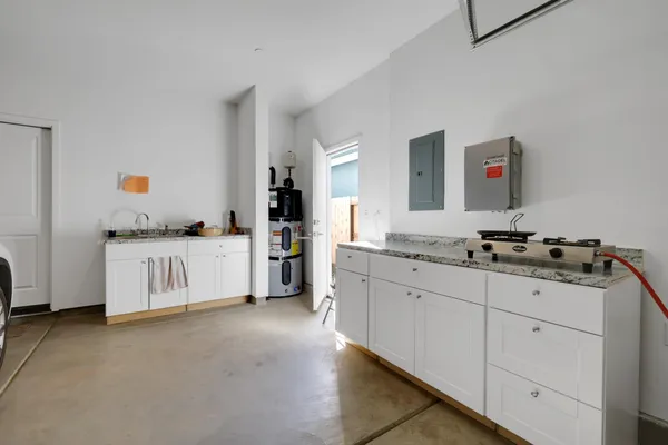 a view of a garage and car parked