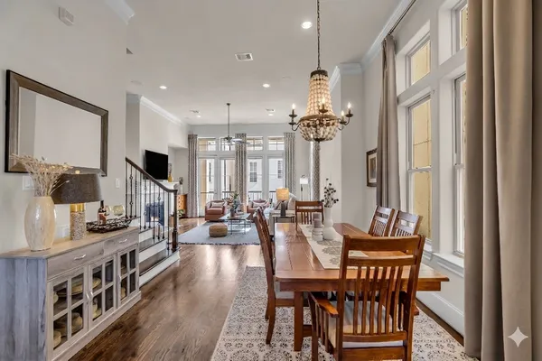 a living room with furniture fireplace and flat screen tv