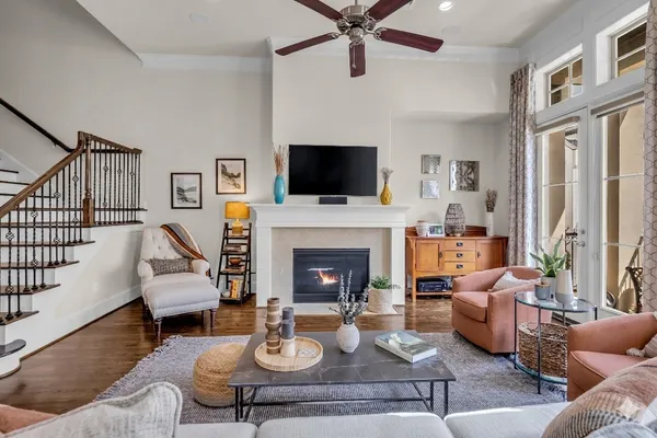 a balcony with table and chairs