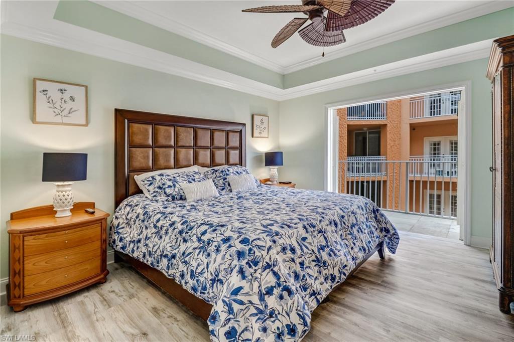 401 Bayfront Place, Unit 3408 Naples, FL 34102 - Photo 7 of 26 a bedroom with a bed and a window