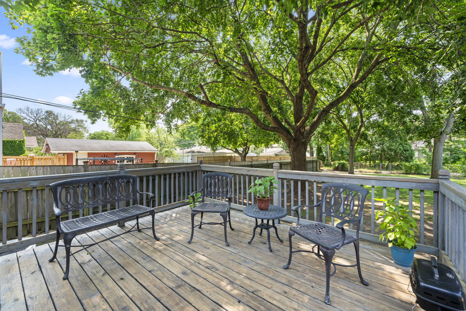 660 1st Street Crete, IL 60417 - Photo 14 of 23 a view of a deck with wooden floor and fence