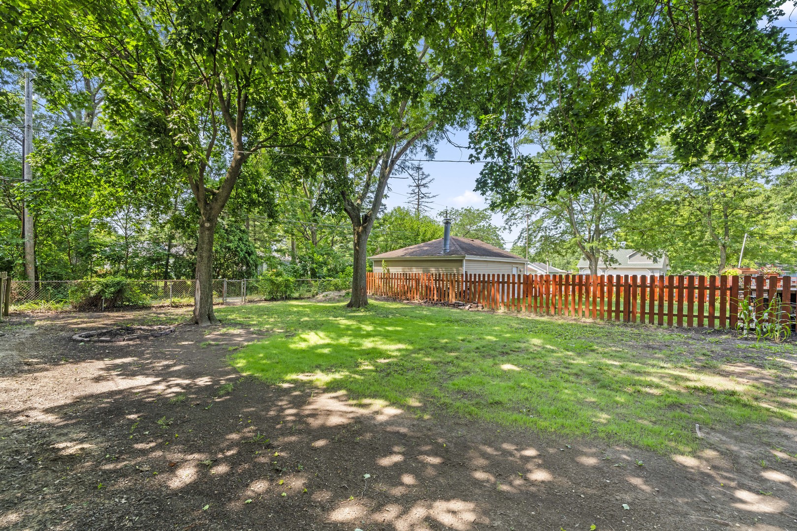 660 1st Street Crete, IL 60417 - Photo 17 of 23 a front view of a house with a yard