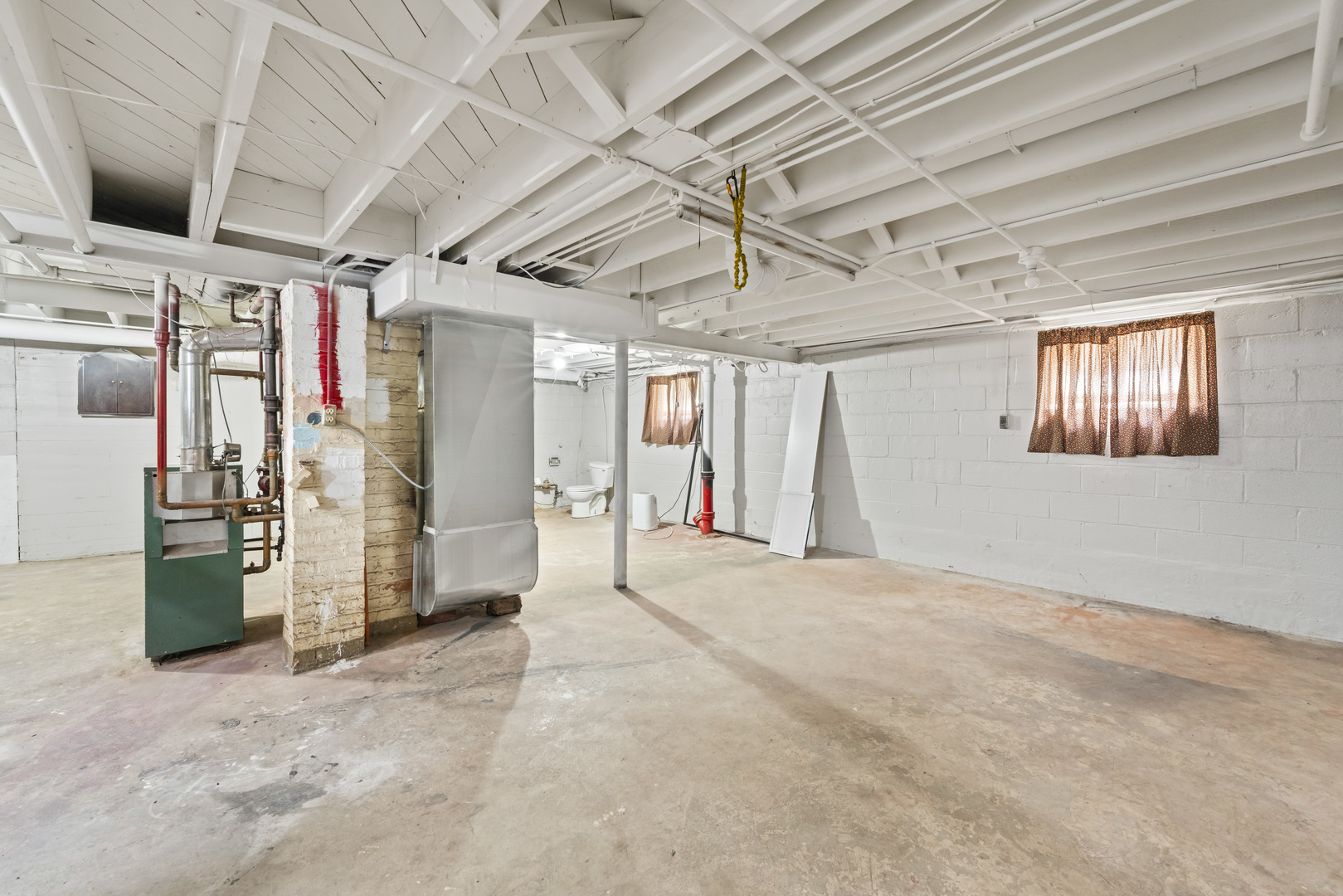 660 1st Street Crete, IL 60417 - Photo 20 of 23 a view of a hallway with closet and chandelier