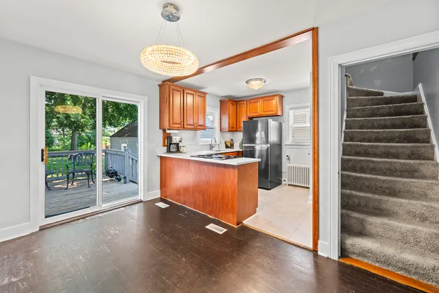 a view of kitchen with cabinets and outdoor view