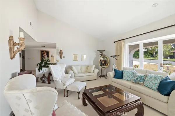 a living room with furniture and a couch