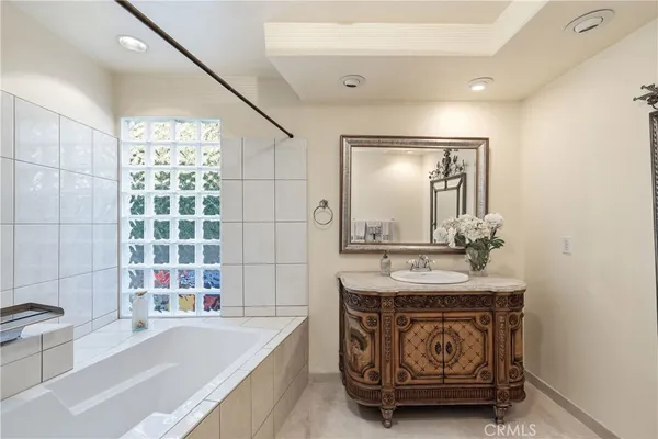a bathroom with a shower and a bathtub
