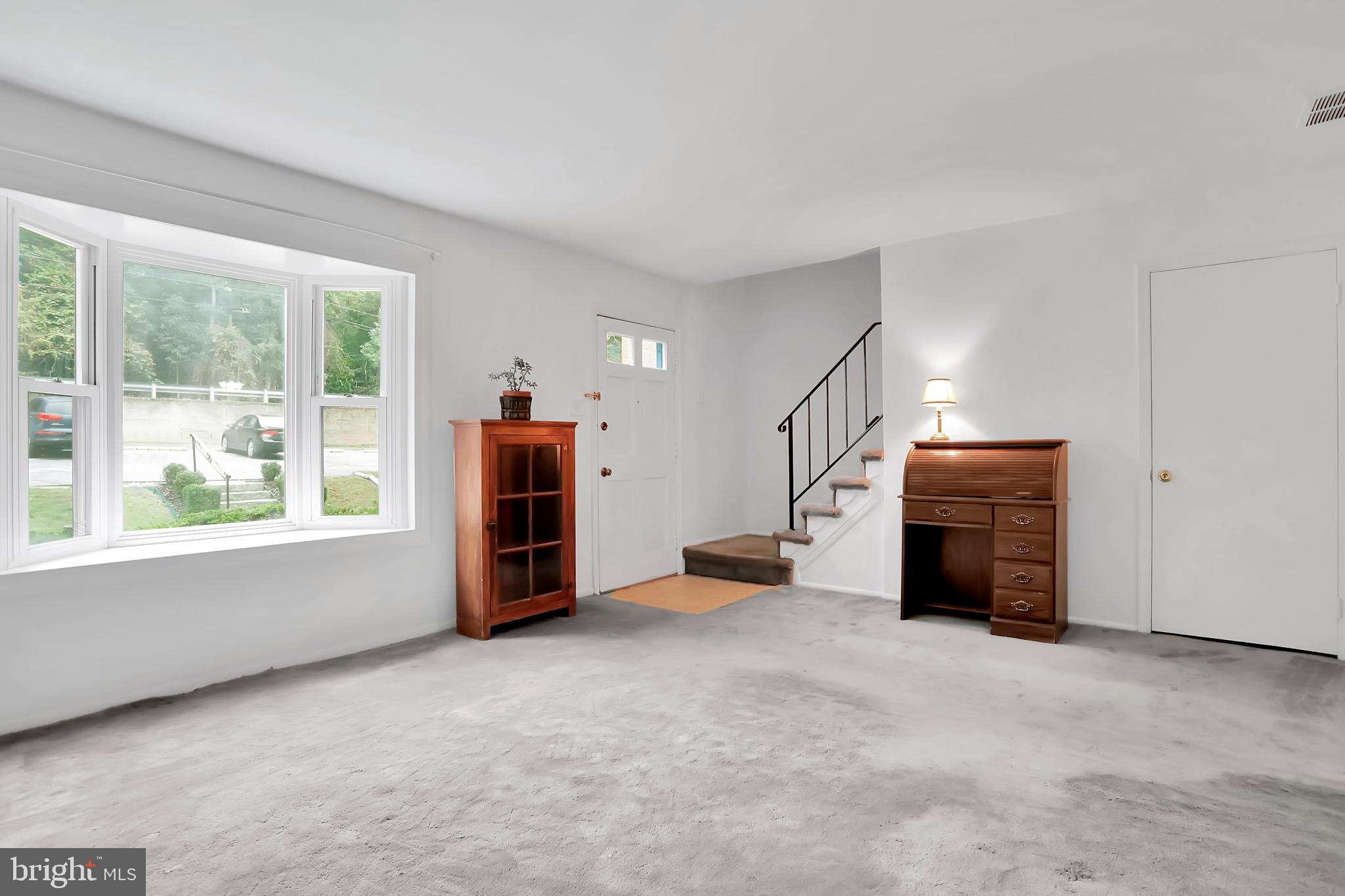 9909 Boise Road Laurel, MD 20708 - Photo 5 of 25 Living Room w/ Large Bay Window