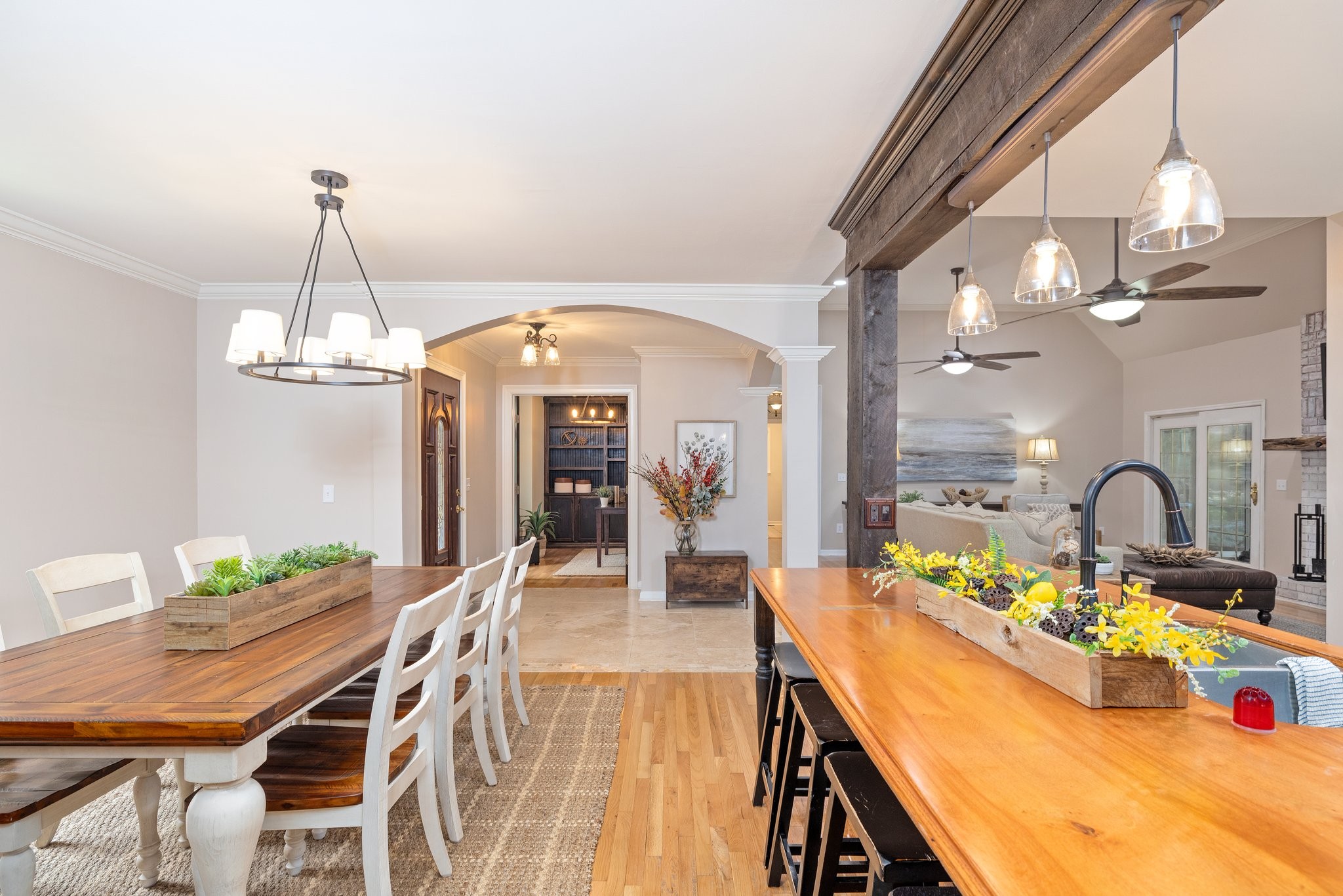 5375 Murfreesboro Road College Grove, TN 37046 - Photo 24 of 70 a dining room with furniture a chandelier and wooden floor