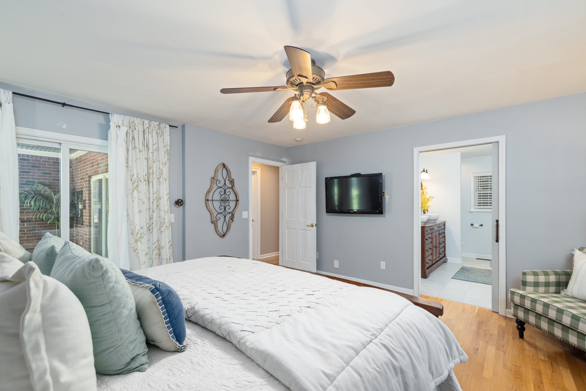 5375 Murfreesboro Road College Grove, TN 37046 - Photo 33 of 70 a bedroom with a bed and a flat screen tv