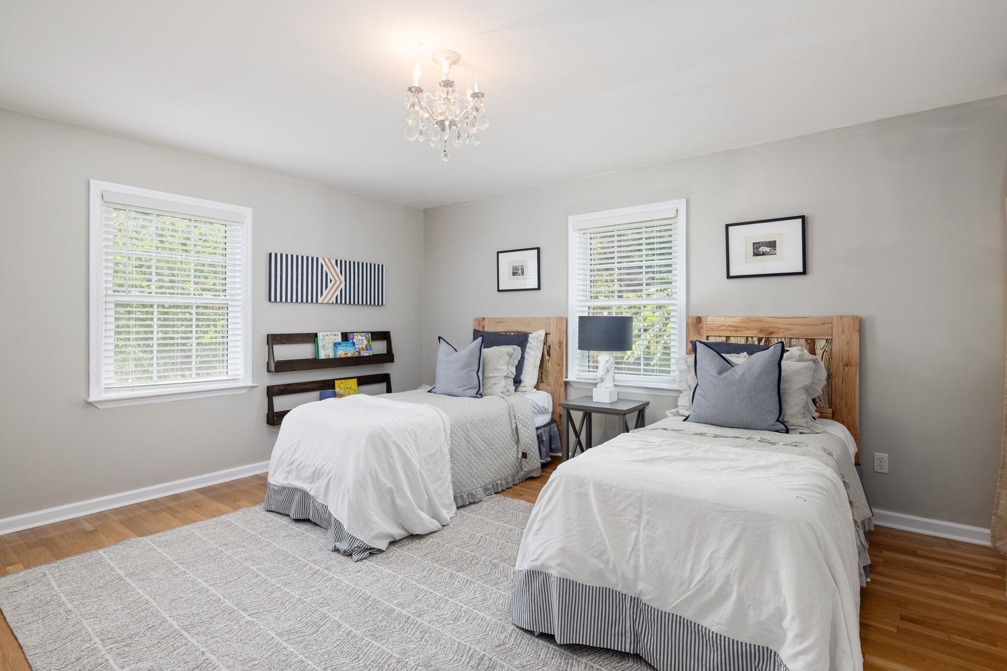 5375 Murfreesboro Road College Grove, TN 37046 - Photo 42 of 70 a spacious bedroom with two beds and a chandelier