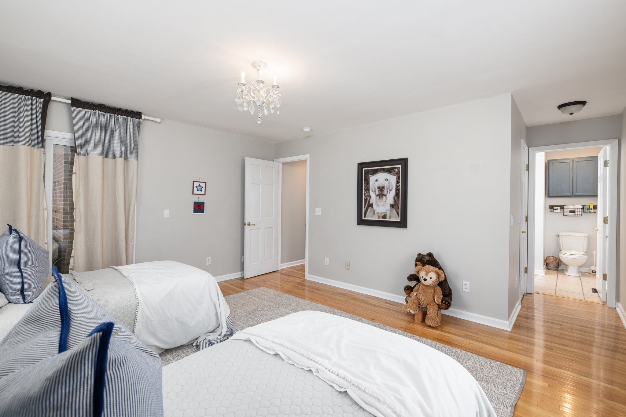 5375 Murfreesboro Road College Grove, TN 37046 - Photo 44 of 70 a bedroom with a bed and wooden floor